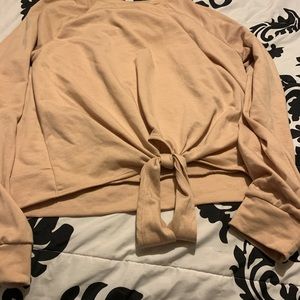 Tan colored sweatsuit top